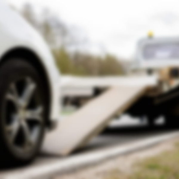 How far will roadside assistance tow a car?